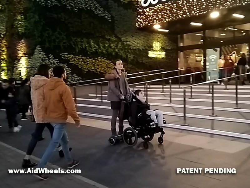 hoverboard wheelchair pushing
