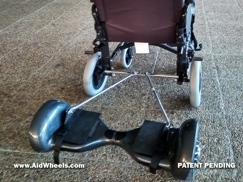 manual wheelchair electric motor pusher