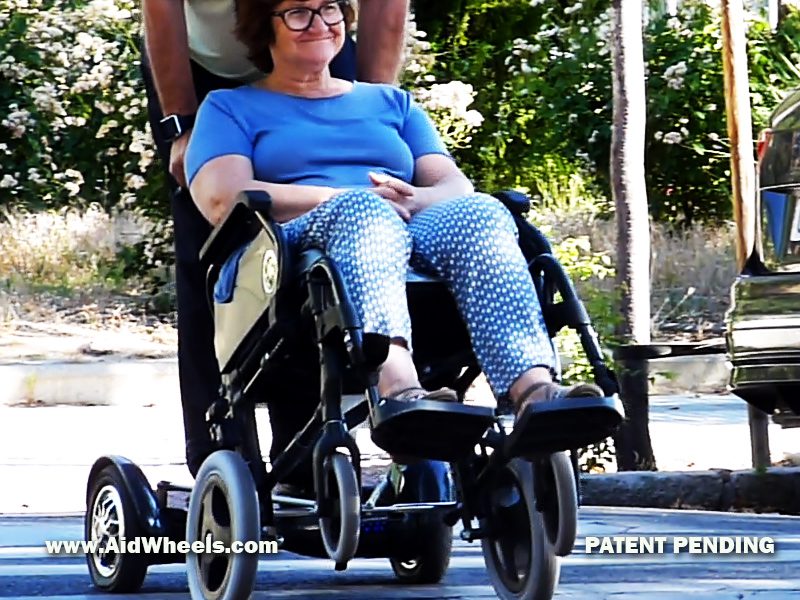 senior wheelchair hoveboard couple