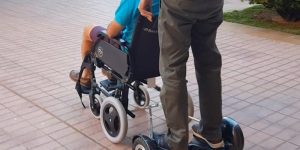 wheelchair hoverboard couple