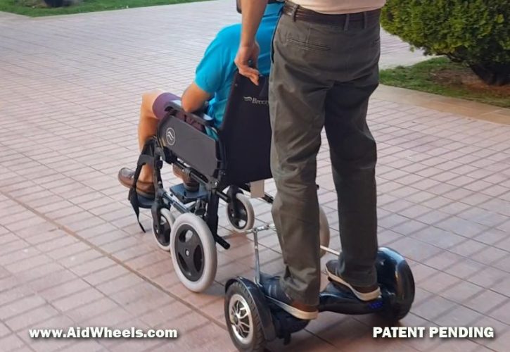 Manual wheelchair power assist by AidWheels