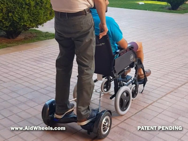 wheelchair power assist caregiver couple
